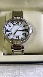 lot 242 image: Silver Tone Wristwatch with Roman Numeral Dial and Crystal Accents in Display Box