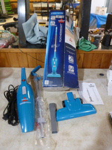 lot 24 image: New Bissell Featherweight Vacuum