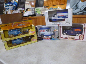 lot 28 image: 5 Die-Cast Trucks and Wagon Banks