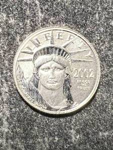 lot 03 image: 2002 AMERICAN PLATINUM EAGLE 110TH OZ .9995 FINE PLATINUM