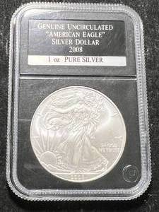 lot 14 image: 2008 AMERICAN SILVER EAGLE 1 TROY OZ .999 FINE SILVER SLABBED UNC
