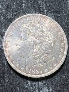 lot 20 image: 1885-O US MORGAN SILVER DOLLAR