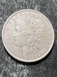 lot 57 image: 1886 US MORGAN SILVER DOLLAR