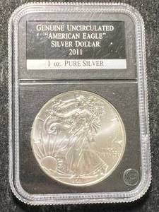 lot 62 image: 2011 AMERICAN SILVER EAGLE 1 TROY OZ .999 FINE SILVER SLABBED UNC