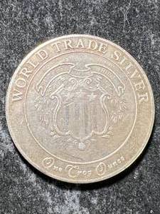 lot 74 image: 1 TROY OZ .999 FINE SILVER WORLD TRADE SILVER ROUND