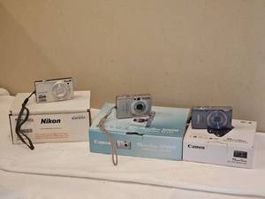 lot 121 image: Digital Camera Group (Powershot SD 600, Powershot 350, Coolpix)