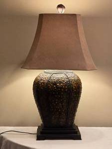 lot 108 image: Uttermost Oversized Textured Bronze Style Table Lamp w Finial