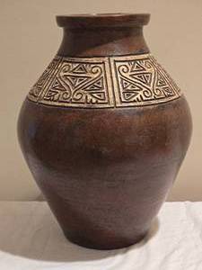 lot 336 image: Decorative Tribal Style Embossed Brown Floor Vase