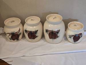 lot 228 image: East Texas Pottery Pinecone Ceramic Canisters  Set of (4) with Lids