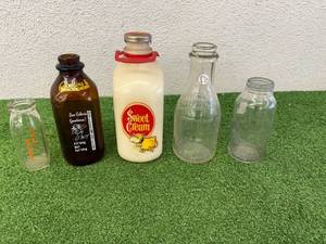 lot 149 image: Glass Dairy Bottles