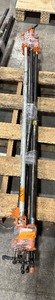 lot 102 image: Pipe bars, various lengths with orange pipe clamps that have swing handles