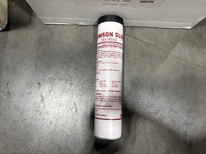 lot 100 image: (4 boxes) US Standard Crimson slide red grease