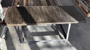 lot 153 image: Rolling table with granite top 54 x 22