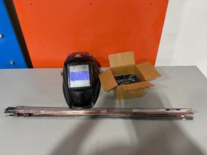 lot 173 image: Miller welding helmet, hex keys, Radnor carbon steel TIG rods, 516x3ft weld rods