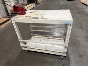 lot 207 image: Mobile workbench with adjustable side slats Measures 43 x 24. Wilton vice grip