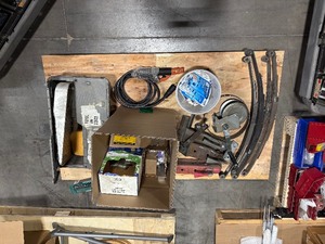 lot 234 image: Leaf springs, cable wench, cold packs, stick electrode holder, grout trowels, gas springs, cable