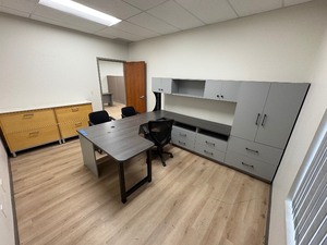 lot 264 image: L-shaped desk, wall-mounted storage system & integrated cabinetry, chairs. 4-drawer full-filing cabinet