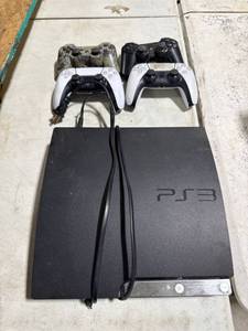 lot 0026 image: PS3 Console with Controllers