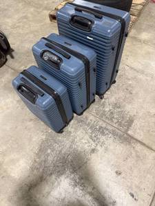 lot 0073 image: Blue Hard-Shell Luggage Set