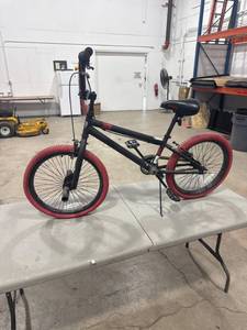 lot 0142 image: Black BMX Red Tire Bicycle