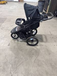 lot 0157 image: Black Jogging Stroller