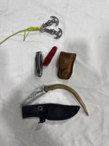 lot 0216 image: Assorted Knives and Grappling Hook