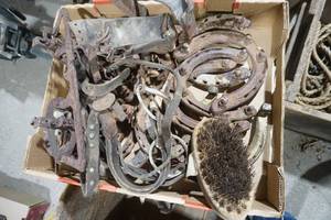 lot 149 image: Horse Shoes, Vintage Ice Skates, Stirrups, and other Horse Tack