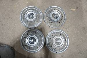 lot 156 image: Vintage Hub Caps (4ct) Chevrolet