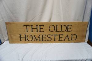 lot 50 image: The Old Homestead Wooden Sign. (table leaf)