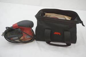 lot 392 image: Skil 5-inch Random Orbital Sander wBag & Pads