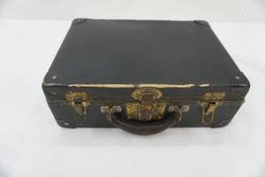 lot 532 image: Vintage Small Suitcase with Vintage Baby Clothes. Eagle Lock Co. Terryville, Connecticut.