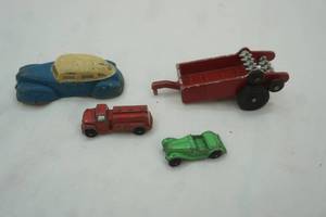 lot 552 image: Vintage Tootsie Toys & Sun Rubber Co. Toy Car