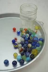 lot 554 image: Vintage Marbles and Jar