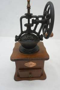 lot 659 image: Coffee Grinder. 11 tall by 5 by 5
