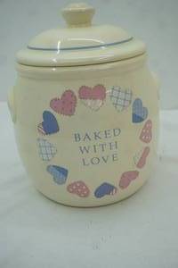 lot 677 image: Ceramic Cookie Jar 10 tall. 7 diameter
