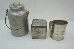 lot 702 image: Vintage Aluminum Milk Can, Liptons Tea Canister, Flour Sifter