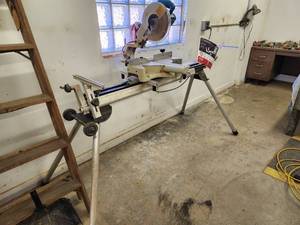 lot 943 image: Makita 10 Miter Saw LS1011 with Trac Rac Portable Workstation