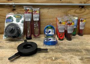 lot 106 image: GrassGator Weed Trimmer lot of 14