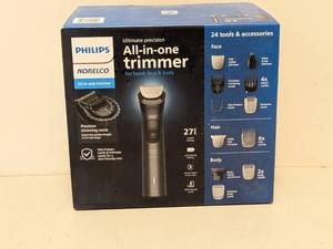 lot 25 image: PHILIPS NORELCO ULTIMATE PRECISION ALL-IN-ONE TRIMMER SET