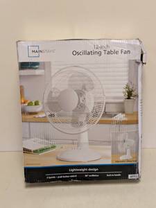 lot 147 image: MAINSTAYS 12 OSCILLATING TABLE FAN