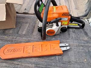 lot 33 image: Stihl MS180C Chain Saw Parts all look to be there