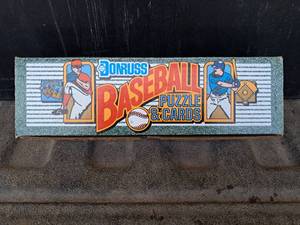 lot 82 image: 1990 Dorus Baseball Cards and Puzzle Set (Full box most packs are sealed)