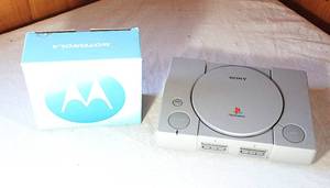 lot 0023 image: Sony PlayStation SCPH-9001 and Motorola Cell Phone in Box