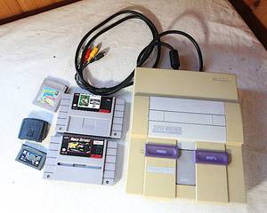 lot 0024 image: Nintendo Super NES Control Deck SNS-001 with Games and Some Misc