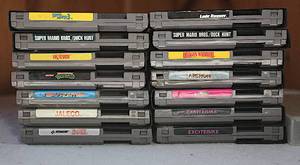 lot 0025 image: Original Nintendo NES Game Cartridge Lot and Controller