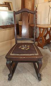 lot 0142 image: Antique Rocking Chair with Hand Embroidered Seat
