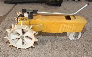 lot 0147 image: Vintage Lawn Tractor Lawn Sprinkler