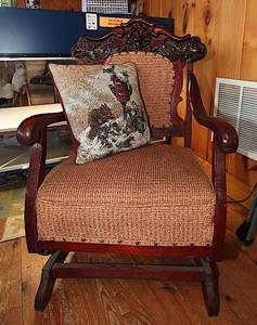 lot 0303 image: Ornate Antique Rocking Chair with Throw Pillow