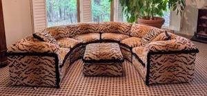 lot 1 image: LR - Tiger Print Upholstered Sectional Sofa with Ottoman