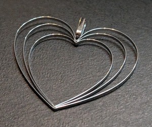 lot 53A image: K - 14k White Gold Open Heart Pendant